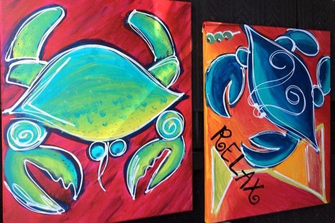 Two pictures of crabs that Angela and Joe painted at date night.