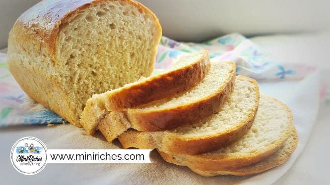 A photo showing a sliced loaf of easy homemade bread.