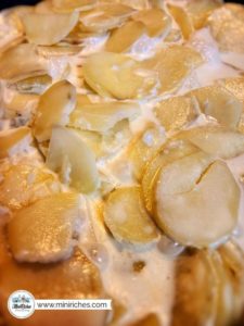 Creating creamy potatoes for mouthwatering pot roast pie.