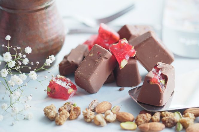 Raspberry nougat chocolate candy life is like a box of chocolates.