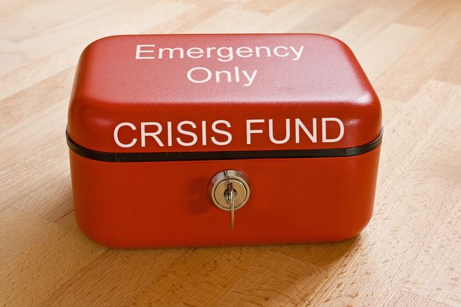 A red case with white letters that say Emergency Only Crisis Fund which is and important part of knowing what financial goals I should have for my family.